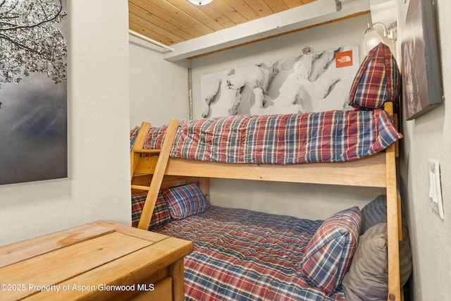 bedroom featuring wood ceiling