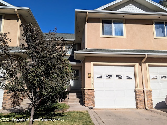 view of front of property featuring a garage