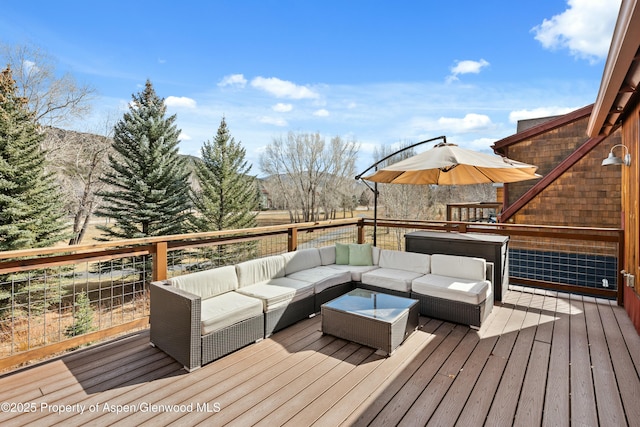 deck featuring outdoor lounge area