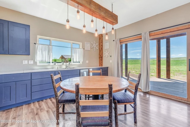 dining space with light wood finished floors