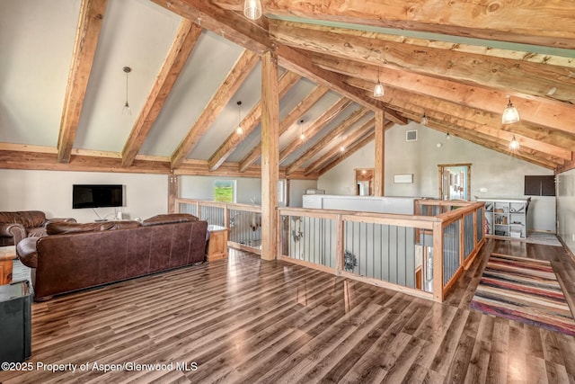 bonus room featuring vaulted ceiling with beams, visible vents, and wood finished floors