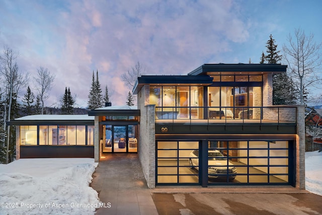 modern home featuring a balcony