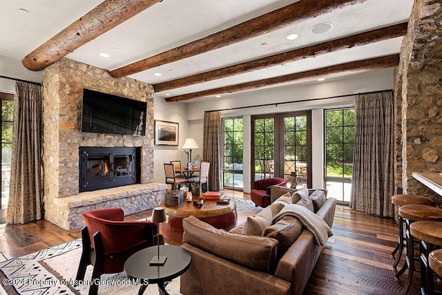 120 Running Mare Rd, Woody Creek, CO 81656 - living area with a stone fireplace, hardwood / wood-style floors, beamed ceiling, and recessed lighting