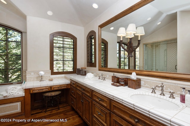 120 Running Mare Rd, Woody Creek, CO 81656 - bathroom with double vanity, healthy amount of natural light, wood finished floors, a chandelier, and recessed lighting