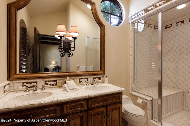 120 Running Mare Rd, Woody Creek, CO 81656 - full bathroom with double vanity, a shower stall, and a chandelier