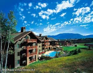 197 Prospector Rd Unit 2302-11, Aspen, CO 81611 - view of building exterior with a mountain view