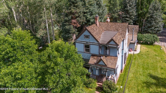 500 W Francis St, Aspen, CO 81611 - view of front facade with an attached garage and a front yard