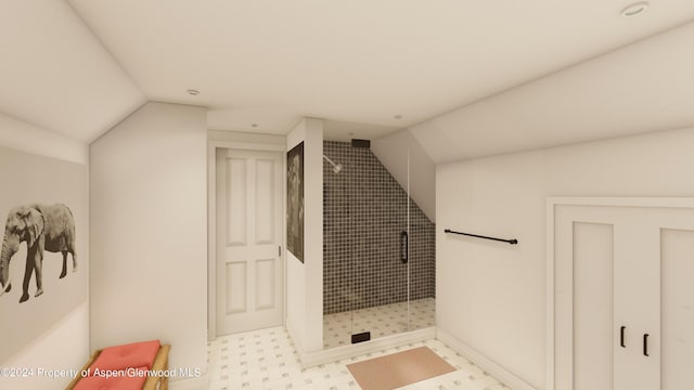500 W Francis St, Aspen, CO 81611 - bathroom featuring a shower stall, vaulted ceiling, and tile patterned floors