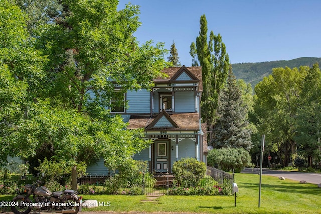 500 W Francis St, Aspen, CO 81611 - victorian home featuring a front yard
