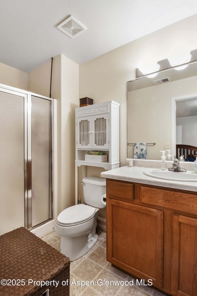 2433 Pine Ln, Rifle, CO 81650 - full bath featuring a shower stall, vanity, and tile patterned flooring