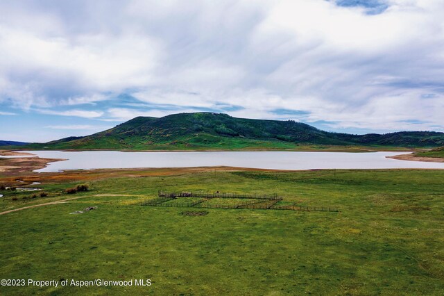 property view of mountains featuring a water view