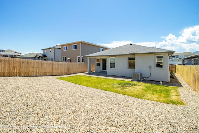 1652 E 17th Cir, Rifle, CO 81650 - rear view of property with a fenced backyard, stucco siding, and roof with shingles