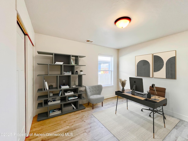 1652 E 17th Cir, Rifle, CO 81650 - home office with wood finished floors and baseboards
