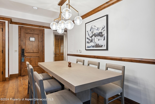 dining area with hardwood / wood-style flooring