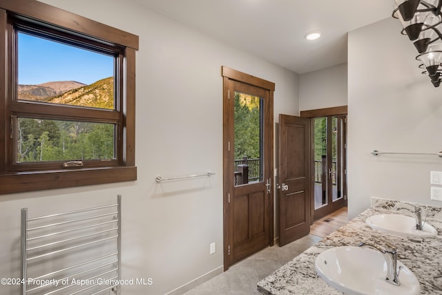 900 Dorais Way, Redstone, CO 81623 - bathroom with double vanity, recessed lighting, and baseboards