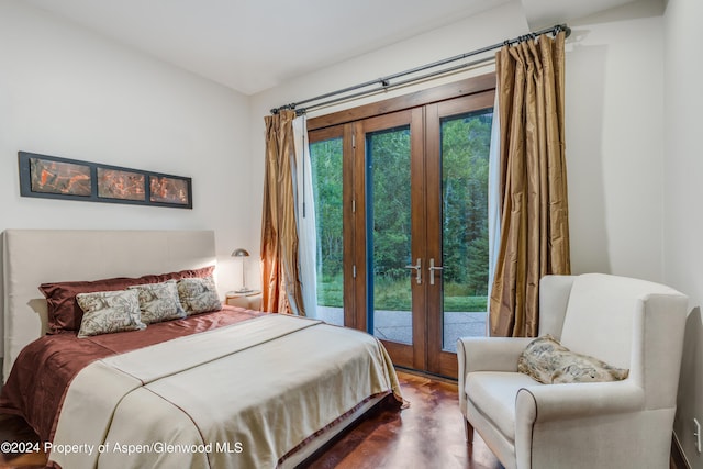 900 Dorais Way, Redstone, CO 81623 - bedroom with french doors, access to outside, and dark wood-style floors