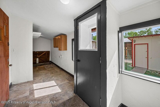 580 Curtis Ave, De Beque, CO 81630 - hall with stone finish floors and baseboards