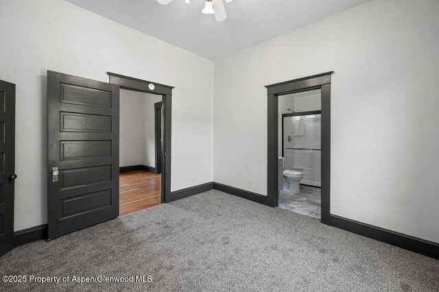 580 Curtis Ave, De Beque, CO 81630 - unfurnished bedroom featuring carpet floors, baseboards, and ensuite bath
