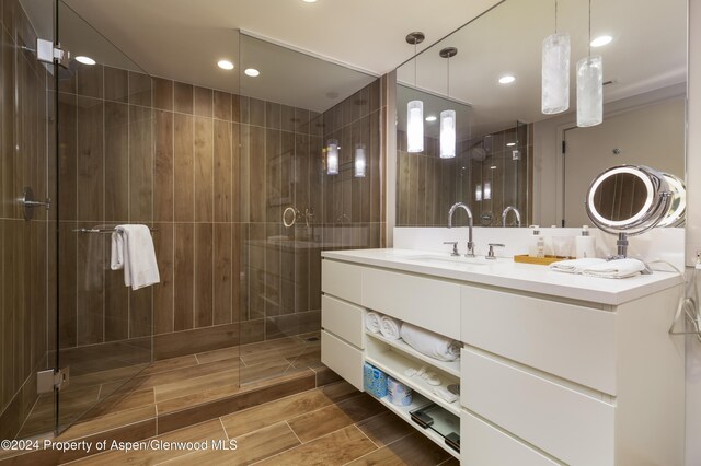 bathroom with vanity and an enclosed shower