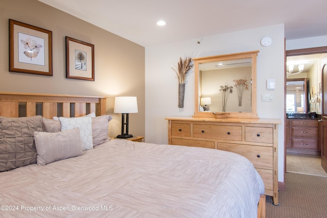 bedroom with light carpet