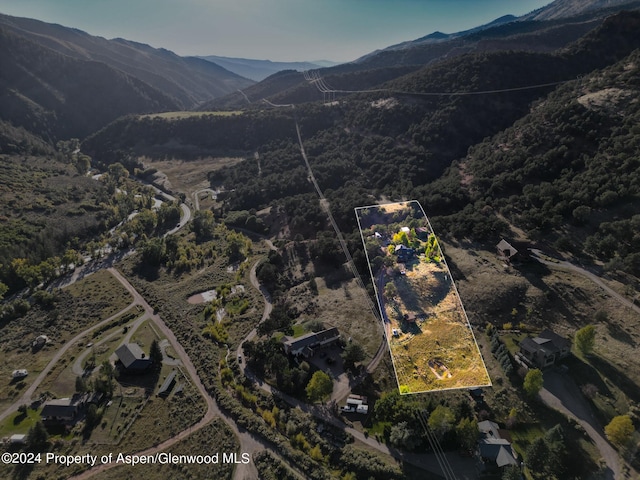 aerial view featuring a mountain view