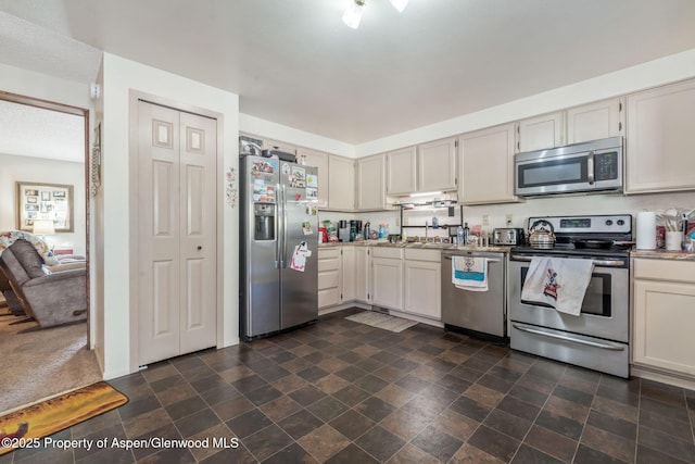 2201/2203 B St, Craig, CO 81625 - kitchen with stainless steel appliances and light countertops