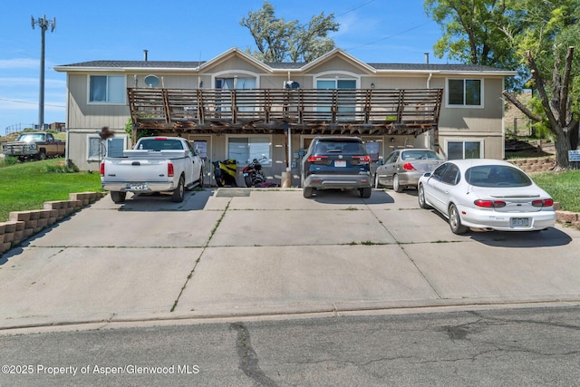 2201/2203 B St, Craig, CO 81625 - townhome / multi-family property with concrete driveway and a carport