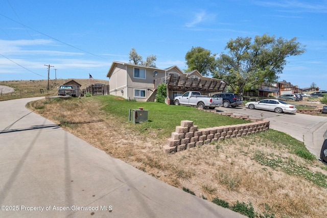 2201/2203 B St, Craig, CO 81625 - view of front of home featuring a front yard and concrete driveway