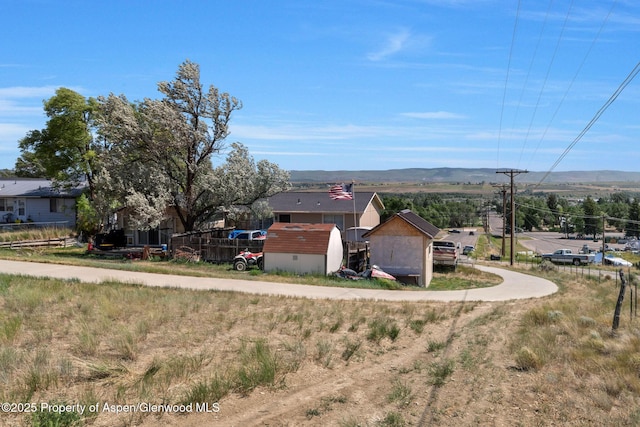 2201/2203 B St, Craig, CO 81625 - view of yard featuring a shed and a mountain view