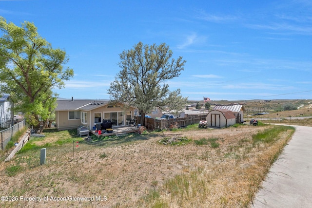 2201/2203 B St, Craig, CO 81625 - fenced backyard featuring a shed