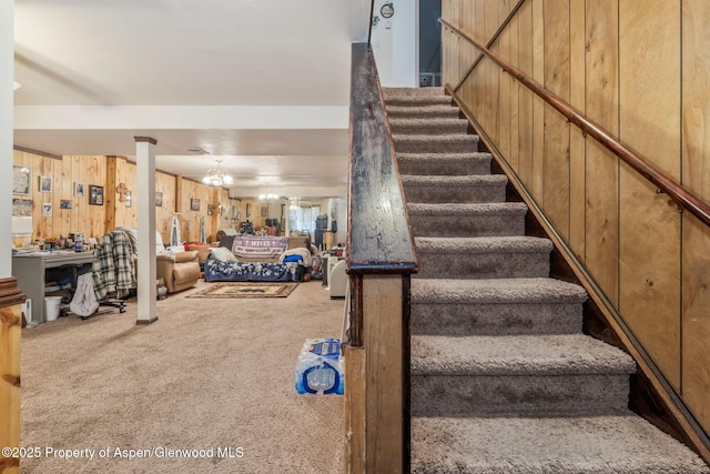 2201/2203 B St, Craig, CO 81625 - stairway featuring carpet floors and wood walls