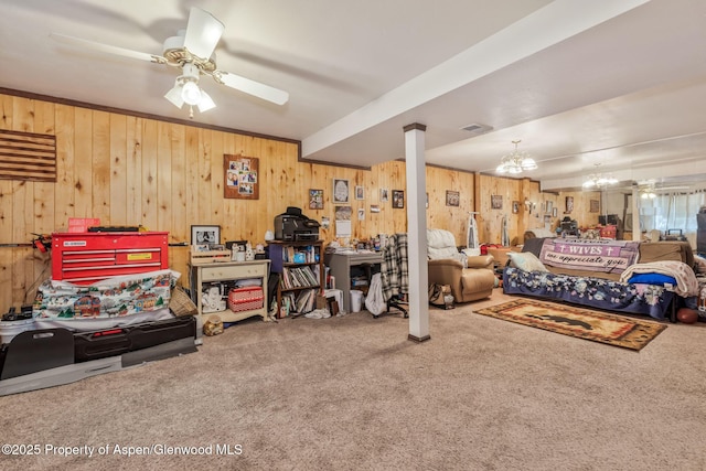 2201/2203 B St, Craig, CO 81625 - carpeted living room with wooden walls and a ceiling fan