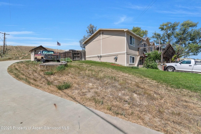 2201/2203 B St, Craig, CO 81625 - view of side of home with a wooden deck
