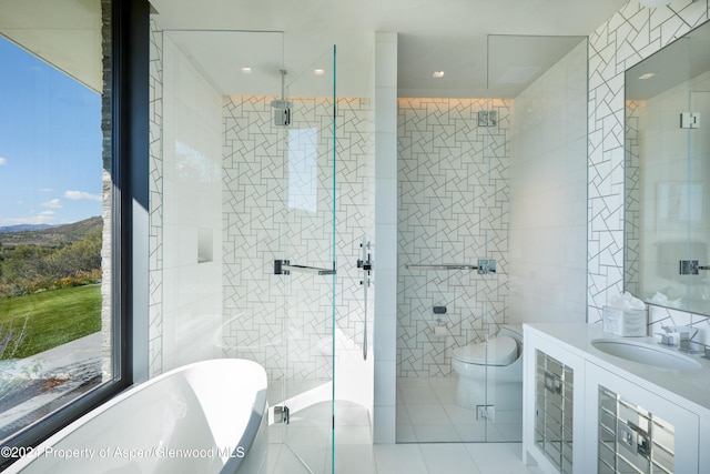 full bathroom with shower with separate bathtub, toilet, tile walls, and tile patterned floors