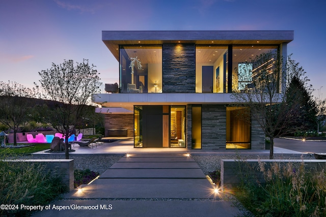 modern home with a patio area