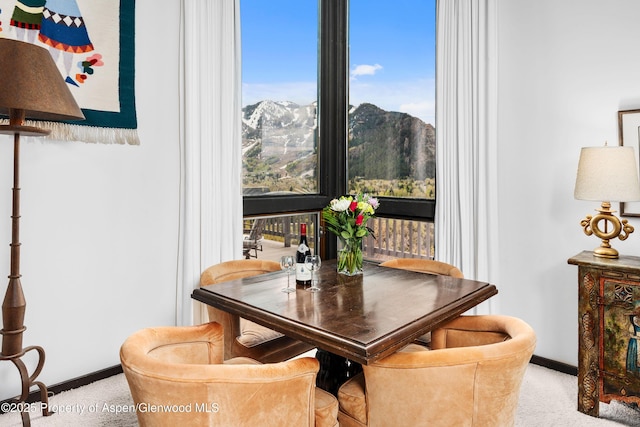 162 Bennett Bench Rd, Aspen, CO 81611 - dining room with carpet floors and healthy amount of natural light