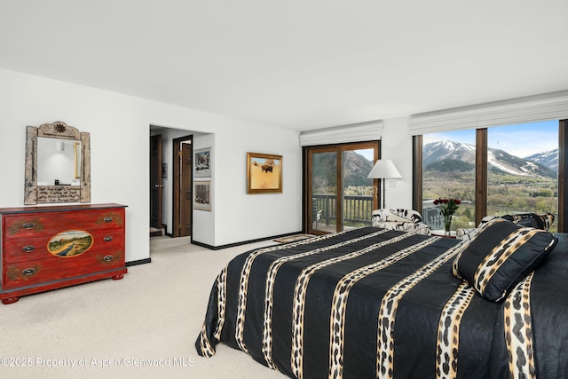 162 Bennett Bench Rd, Aspen, CO 81611 - bedroom featuring access to exterior, carpet floors, and a mountain view