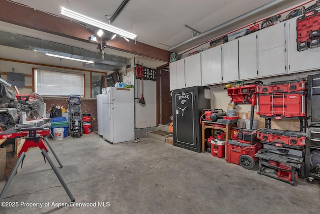 1186 Washington St, Craig, CO 81625 - garage with freestanding refrigerator