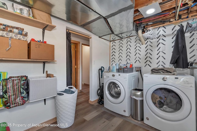 1186 Washington St, Craig, CO 81625 - washroom with independent washer and dryer and wood finished floors