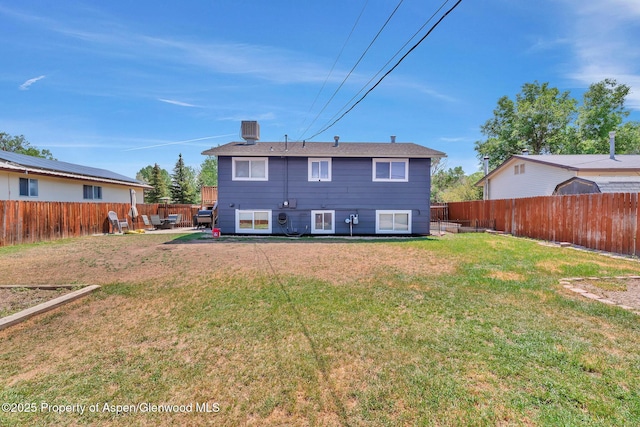 1186 Washington St, Craig, CO 81625 - back of property featuring a fenced backyard and a patio