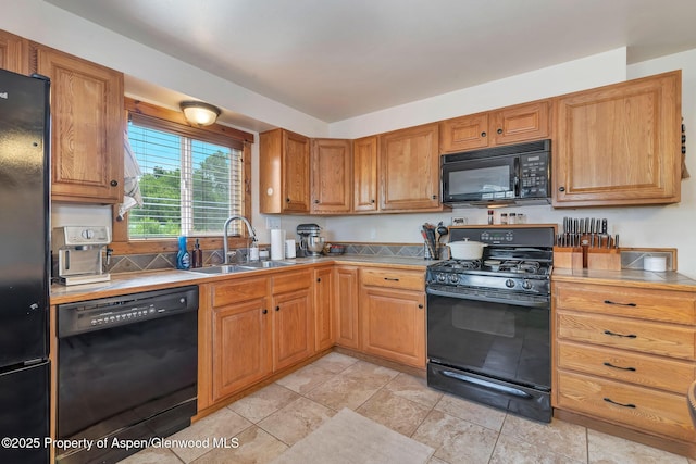 1186 Washington St, Craig, CO 81625 - kitchen with black appliances and light countertops