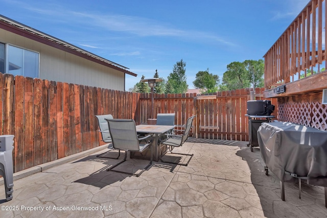 1186 Washington St, Craig, CO 81625 - view of patio / terrace with outdoor dining space and a grill