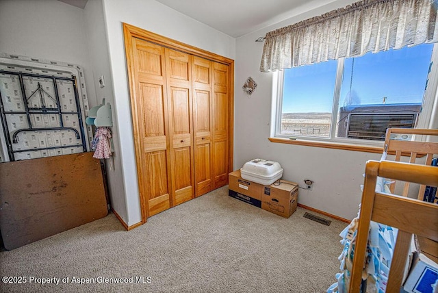 37 Pronghorn Rd, Craig, CO 81625 - bedroom featuring carpet flooring, a closet, and cooling unit