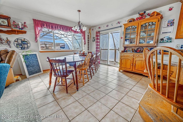 37 Pronghorn Rd, Craig, CO 81625 - dining area featuring a chandelier, healthy amount of natural light, and light tile patterned floors