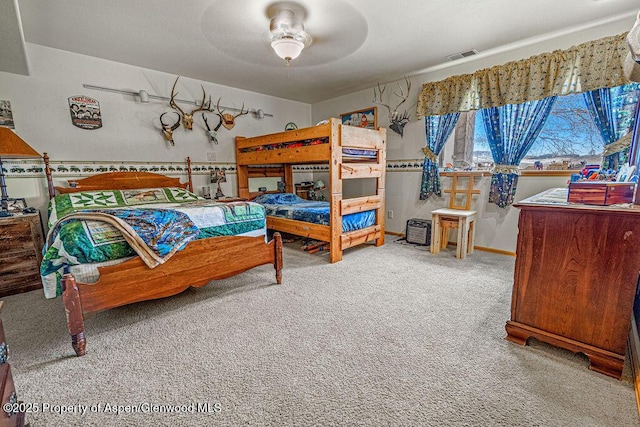 37 Pronghorn Rd, Craig, CO 81625 - carpeted bedroom with a ceiling fan