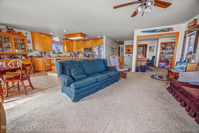 37 Pronghorn Rd, Craig, CO 81625 - living room featuring ceiling fan, light tile patterned floors, recessed lighting, and light colored carpet