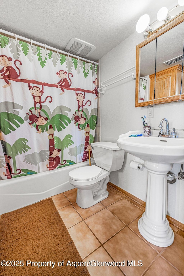 37 Pronghorn Rd, Craig, CO 81625 - full bath with tile patterned flooring, a textured ceiling, and shower / bathtub combination with curtain