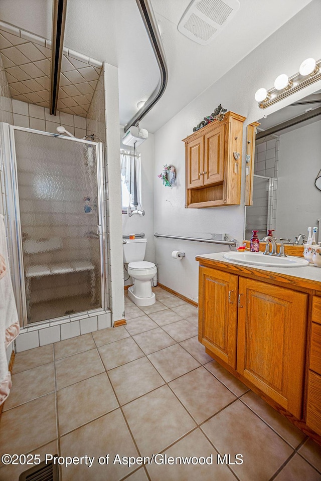37 Pronghorn Rd, Craig, CO 81625 - full bathroom featuring vanity, a stall shower, and tile patterned floors