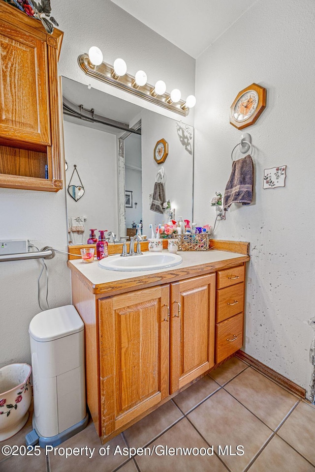 37 Pronghorn Rd, Craig, CO 81625 - bathroom with vanity and tile patterned flooring