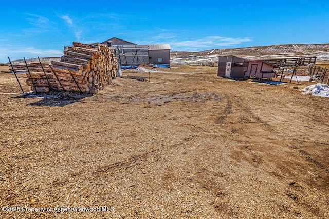 37 Pronghorn Rd, Craig, CO 81625 - view of yard with a storage shed and a mountain view
